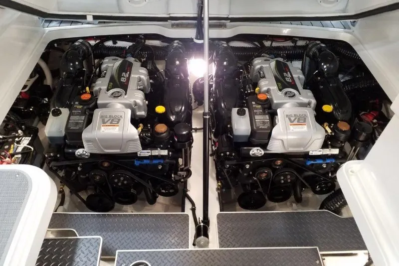 Slide: The Image of Twin V8 engines in a 2021 Formula 330 Crossover Bowrider boat engine compartment. - 25
