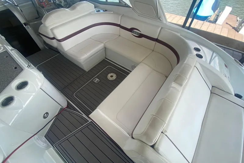 Slide: The Image of 2007 Formula 310 Sun Sport boat interior with white seating and sleek design. - 11