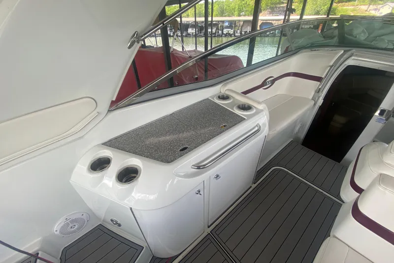 Slide: The Image of 2007 Formula 310 Sun Sport boat interior with sleek seating and modern amenities. - 12