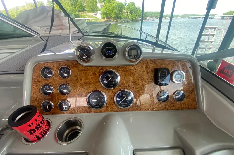 Slide: The Image of Dashboard of a 2007 Formula 310 Sun Sport boat with gauges and controls. - 18