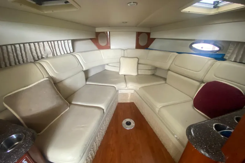 Slide: The Image of Luxurious interior of 2007 Formula 310 Sun Sport boat with plush seating and elegant design. - 20