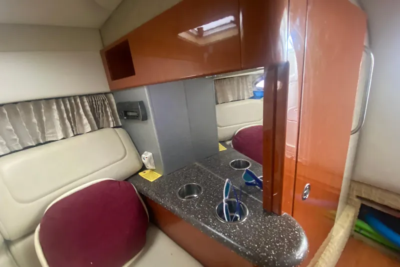 Slide: The Image of Interior of a 2007 Formula 310 Sun Sport boat with seating and storage. - 22
