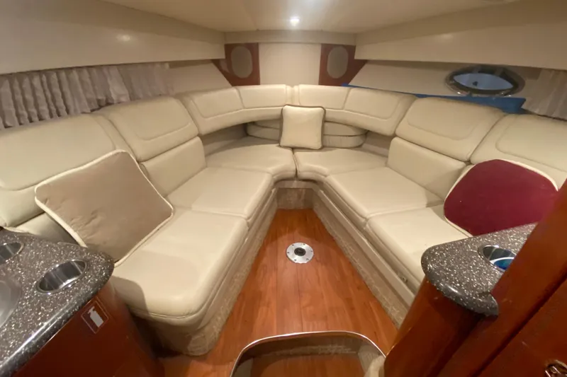 Slide: The Image of Luxurious interior of a 2007 Formula 310 Sun Sport boat with plush seating. - 27