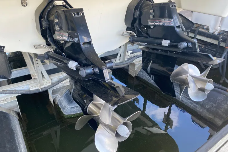 Slide: The Image of 2007 Formula 310 Sun Sport boat with dual MerCruiser outdrives and stainless steel propellers. - 7