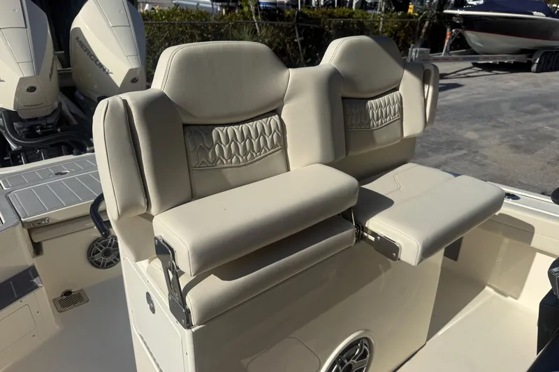 Slide: The Image of Luxury seating on 2026 Scout 281 XSS boat, featuring premium upholstery and modern design. - 21