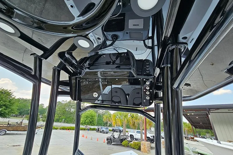 Slide: The Image of Interior view of 2026 Sea Pro 230 Bay boat's helm station with modern controls. - 19