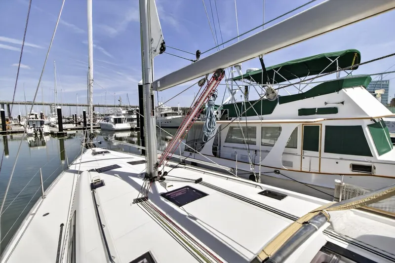 Slide: The Image of Beneteau Oceanis 48 sailboat docked in marina, 2012 model, sunny day. - 15