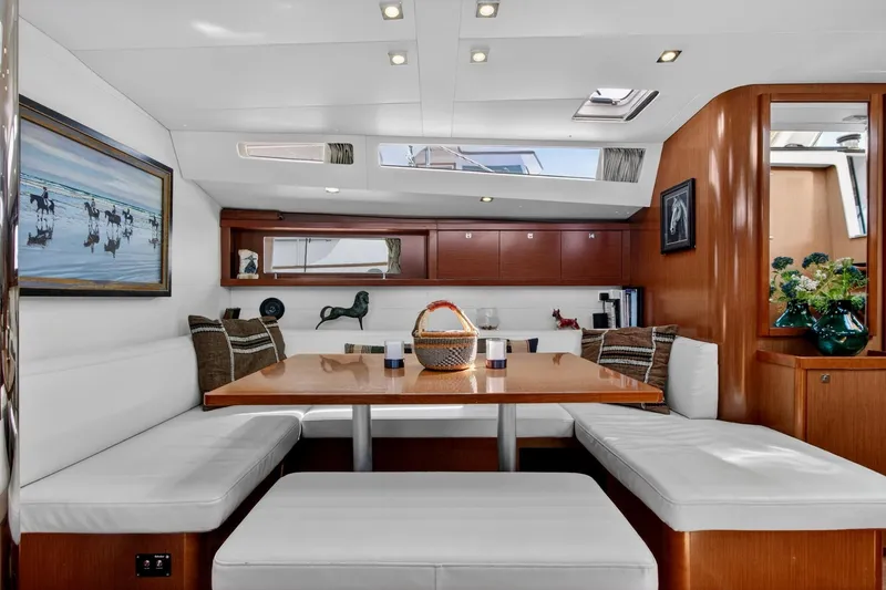 Slide: The Image of Luxurious interior of 2012 Beneteau Oceanis 48 yacht with elegant dining area and modern decor. - 30