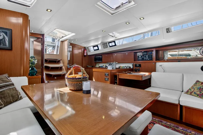 Slide: The Image of Luxurious interior of 2012 Beneteau Oceanis 48 yacht with modern amenities and elegant design. - 31