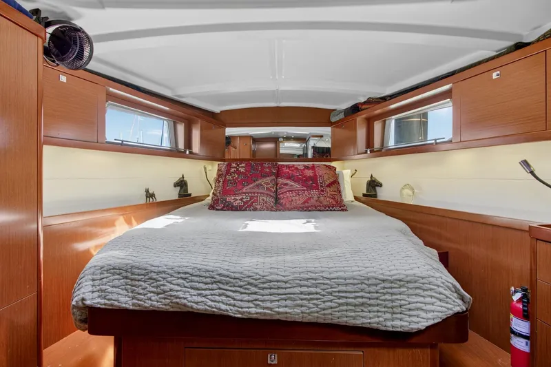 Slide: The Image of Luxurious cabin interior of 2012 Beneteau Oceanis 48 yacht with cozy bedding. - 41