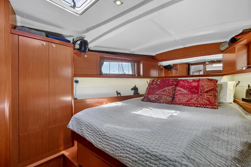Slide: The Image of Luxurious cabin interior of 2012 Beneteau Oceanis 48 yacht with elegant wood finish. - 42