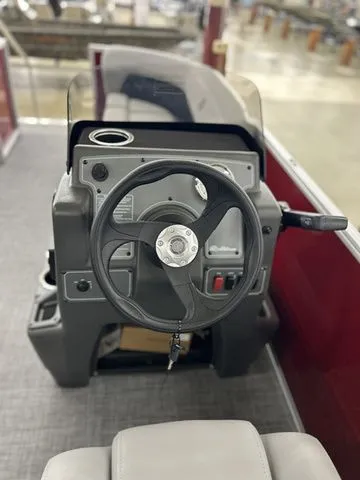 Slide: The Image of Steering console of Sun Tracker Party Barge 16 DLX 2026. - 10