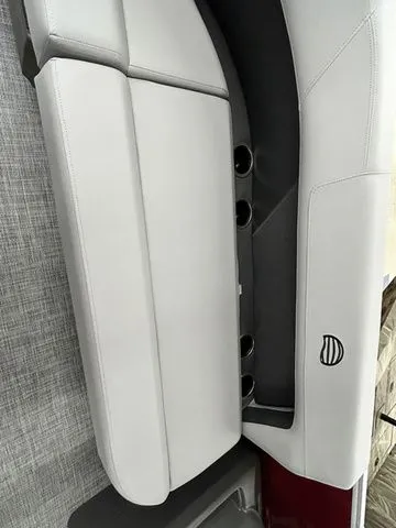 Slide: The Image of Interior of Sun Tracker Party Barge 16 DLX 2026 with gray upholstery. - 5