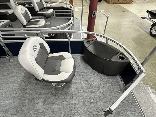 Slide: The Image of Interior of 2026 Sun Tracker Bass Buggy 18 DLX with seat and console. - 5