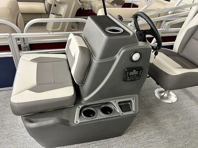 Slide: The Image of Interior of 2026 Sun Tracker Bass Buggy 18 DLX with helm console. - 7