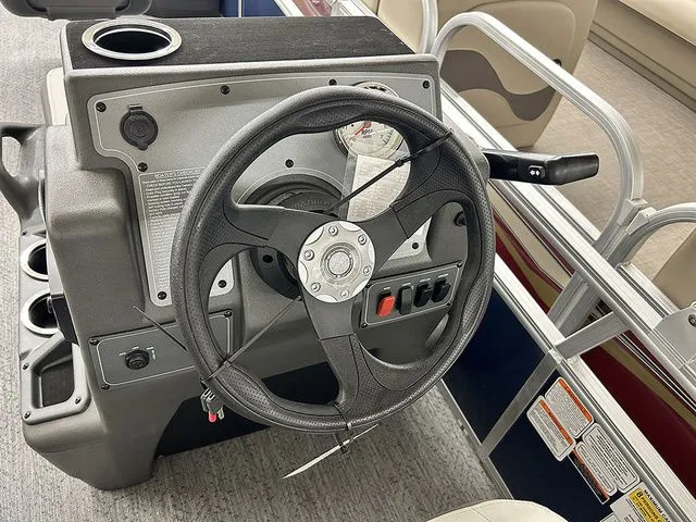 Slide: The Image of Steering console of the 2026 Sun Tracker Bass Buggy 18 DLX. - 8