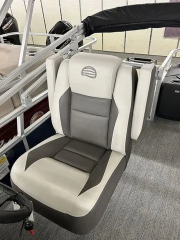 Slide: The Image of 2026 Sun Tracker Bass Buggy 18 DLX seat in gray and white design. - 9