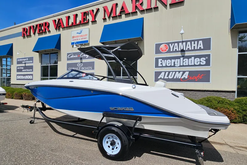 The Image of 2014 Scarab 215 boat displayed at River Valley Marine dealership. - 1