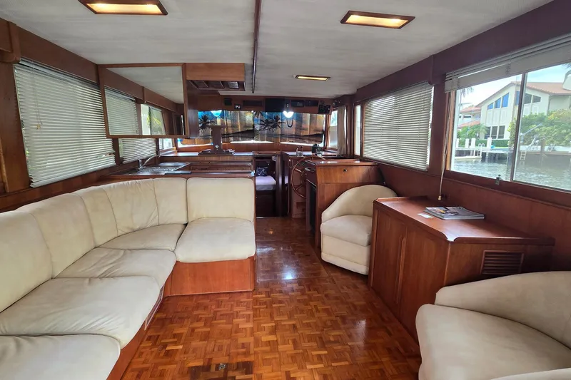 Slide: The Image of Luxurious interior of 1997 Grand Banks 46 Europa yacht with elegant wood finish and plush seating. - 4