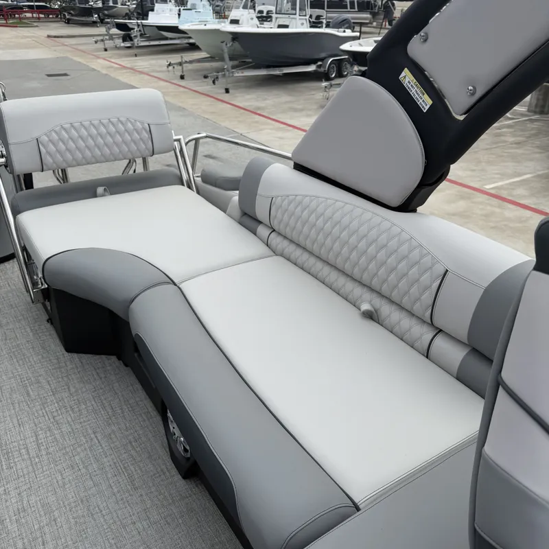 Slide: The Image of Luxurious seating in Avalon QLS25T Excalibur 2026 boat. - 26