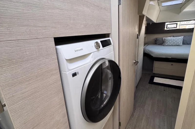 Slide: The Image of Laundry area in a 2020 Leopard 50 yacht with a Samsung washer. - 22