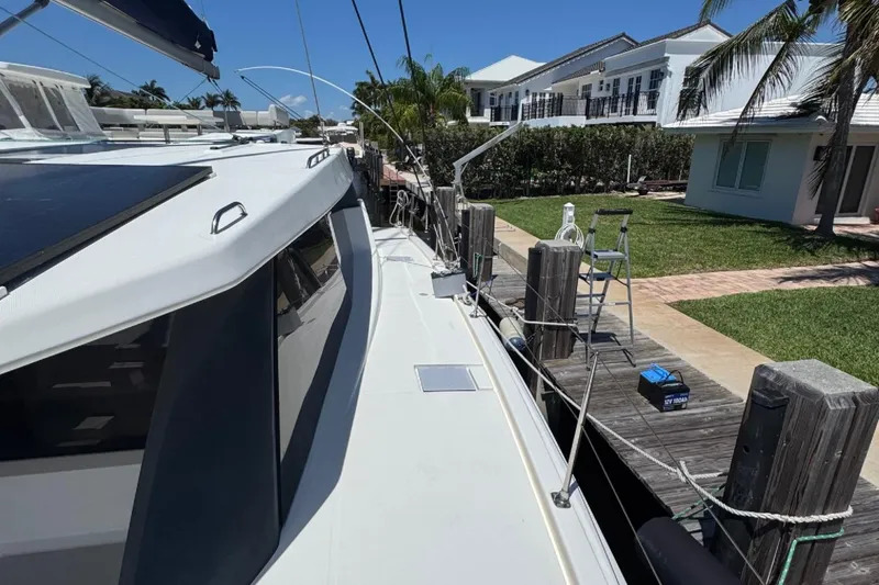 Slide: The Image of 2020 Leopard 50 yacht docked at marina with clear blue sky. - 27