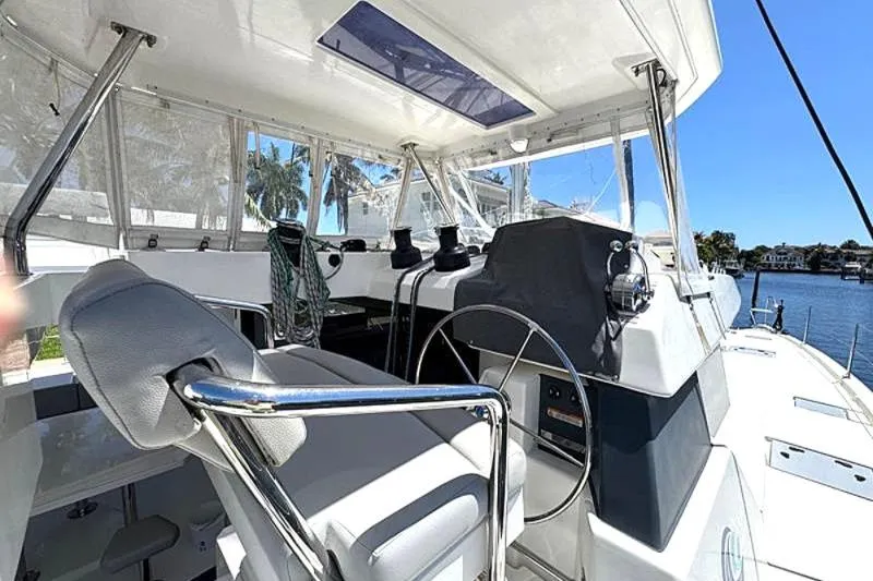 Slide: The Image of Helm of 2020 Leopard 50 yacht with modern controls and waterfront view. - 32