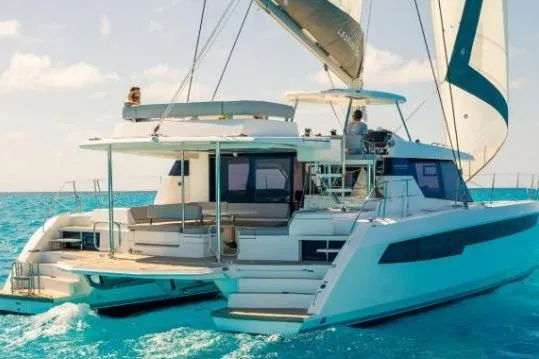 Slide: The Image of 2020 Leopard 50 catamaran sailing on clear blue ocean waters. - 42