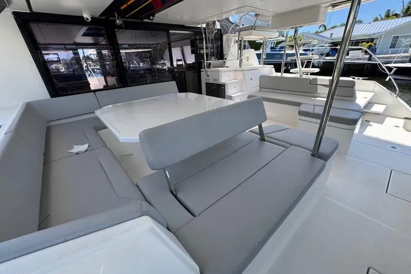 Slide: The Image of Spacious seating area on a 2020 Leopard 50 yacht with modern design. - 9
