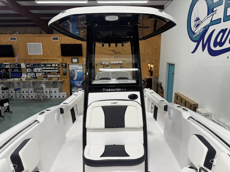 Slide: The Image of Interior view of 2026 Tidewater 232 CC Adventure boat in showroom. - 12
