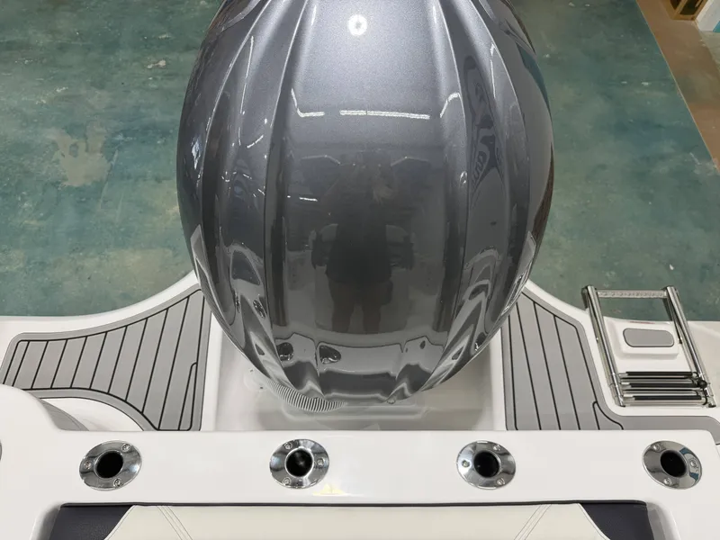 Slide: The Image of 2026 Tidewater 232 CC Adventure boat hull and deck view. - 20