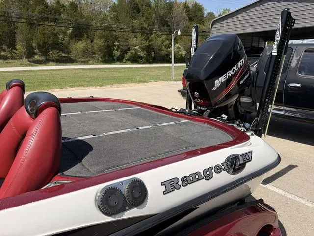 Slide: The Image of Ranger Z20 boat from 2026 with Mercury engine parked outdoors. - 15