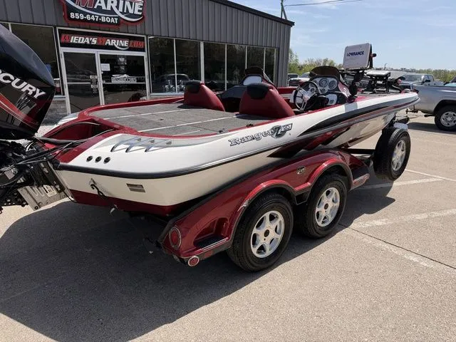 Slide: The Image of Ranger Z20 2026 boat on trailer outside a marine shop. - 4