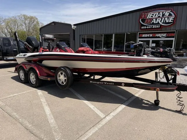 Slide: The Image of 2026 Ranger Z20 boat parked outside a marine shop. - 9