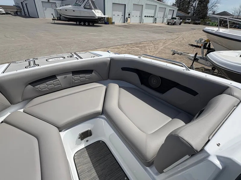 Slide: The Image of Interior of Four Winns HD3 boat, 2023 model, featuring gray upholstery. - 14