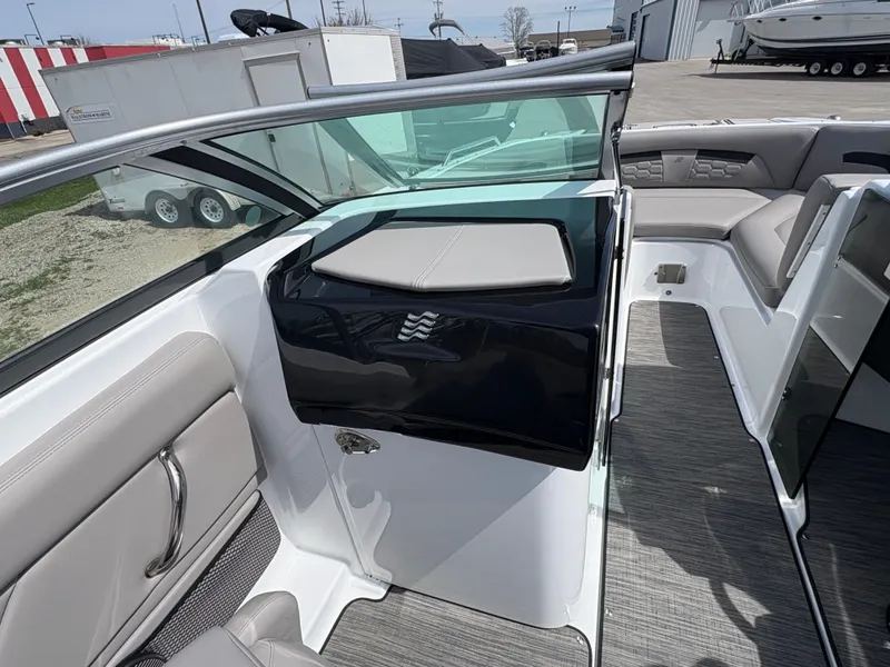 Slide: The Image of Interior of a 2023 Four Winns HD3 boat with gray upholstery. - 15