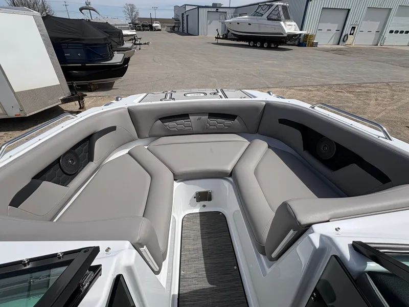 Slide: The Image of Interior of Four Winns HD3 boat, 2023 model, featuring gray upholstery. - 18