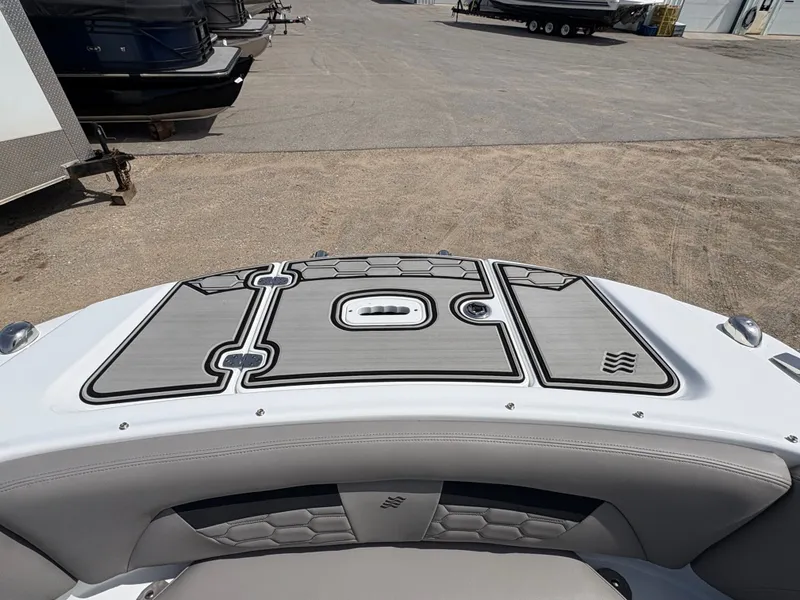 Slide: The Image of 2023 Four Winns HD3 boat with modern deck design. - 19