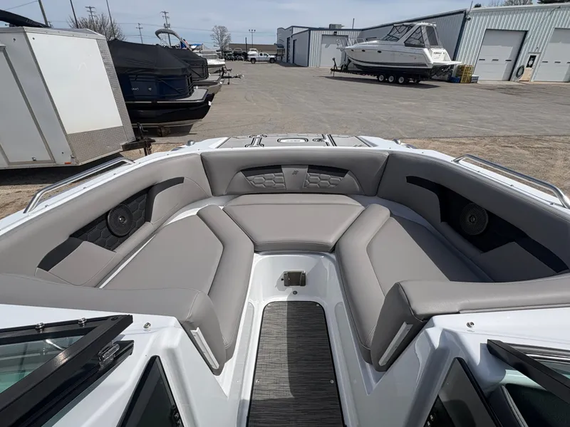 Slide: The Image of Interior view of 2023 Four Winns HD3 boat with gray seating. - 9