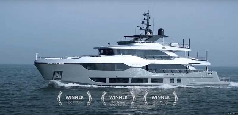 Slide: The Image of Majesty 120 yacht 2025 cruising, award-winning design, luxury vessel on open sea. - 15