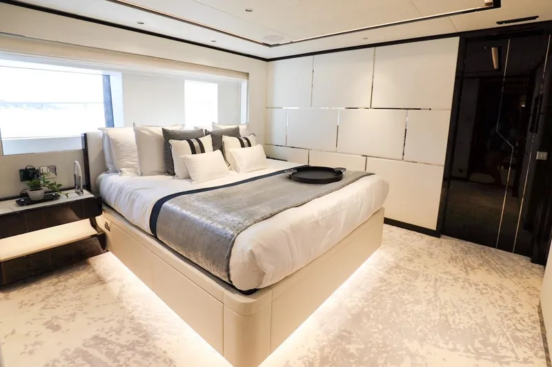 Slide: The Image of Luxurious bedroom interior on 2025 Majesty 120 yacht, featuring modern design and elegant furnishings. - 53