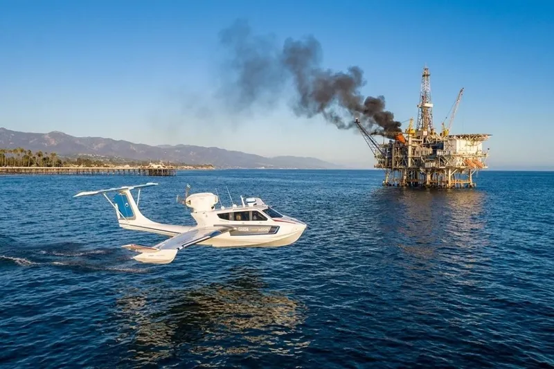 Slide: The Image of Seaplane Aron M 80 (2026) flying near offshore oil rig with smoke. - 3