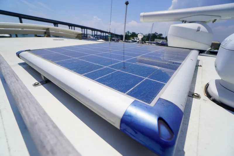 Slide: The Image of Solar panel on 2001 Redfern Mitchell Cove 32 boat under clear sky. - 35