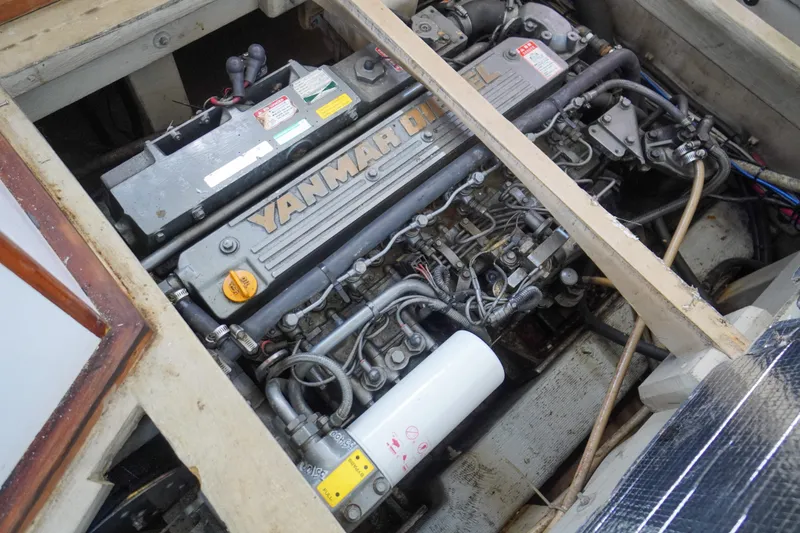 Slide: The Image of Engine compartment of a 2001 Redfern Mitchell Cove 32 with Yanmar diesel engine. - 39