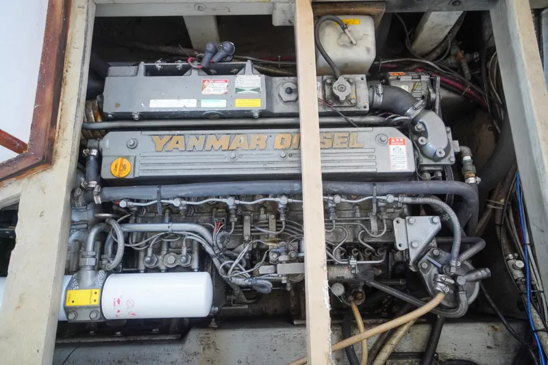 Slide: The Image of Yanmar diesel engine in a 2001 Redfern Mitchell Cove 32 boat. - 40