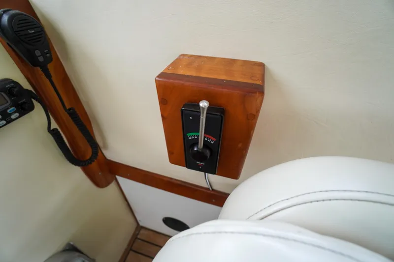 Slide: The Image of Control panel and microphone in a 2001 Redfern Mitchell Cove 32 boat interior. - 49