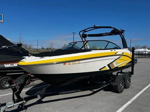 The Image of 2015 Chaparral Vortex 223 VRX boat on trailer outdoors. - 1