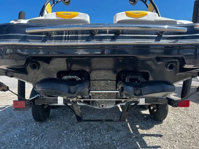 Slide: The Image of Rear view of a 2015 Chaparral Vortex 223 VRX boat on a trailer. - 16