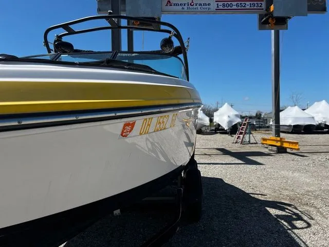 Slide: The Image of 2015 Chaparral Vortex 223 VRX boat on a trailer outdoors. - 4