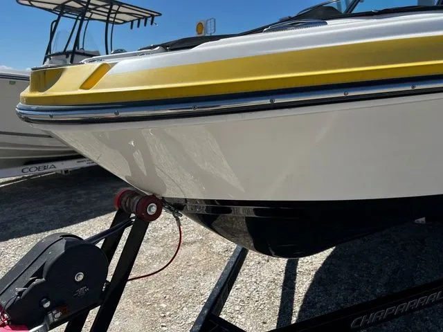 Slide: The Image of 2015 Chaparral Vortex 223 VRX boat on trailer, yellow accents. - 5